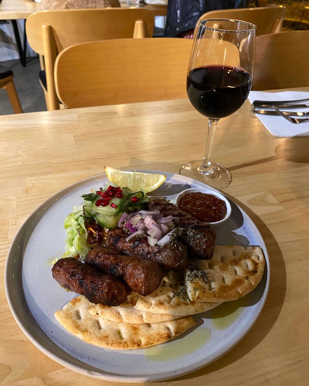 Cevapi with pita bread and salad at Black Drop, Black Rock