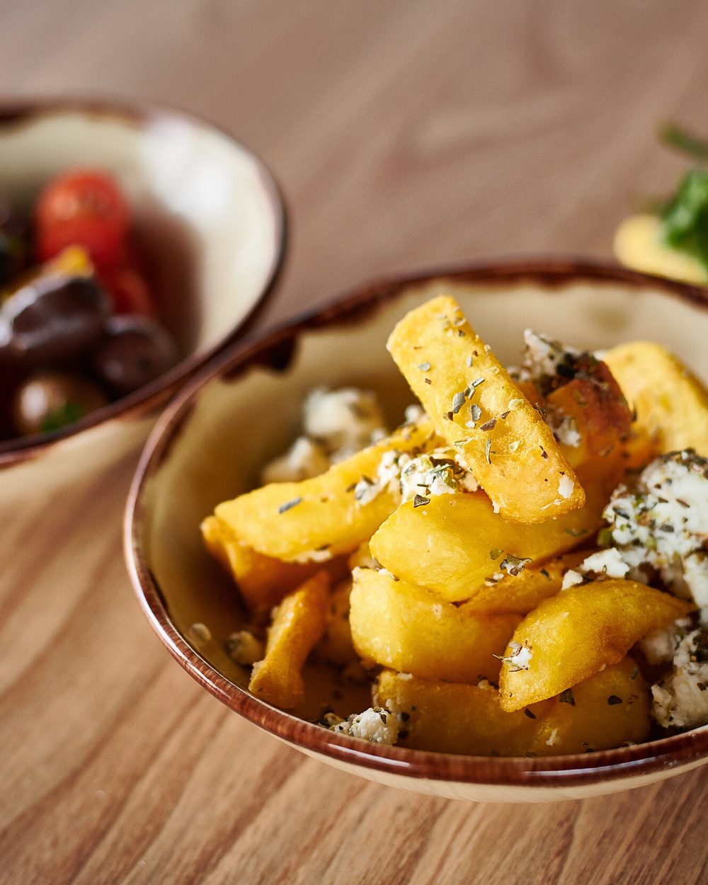 Chips with feta and oregano and marinated olives at Black Drop, Black Rock