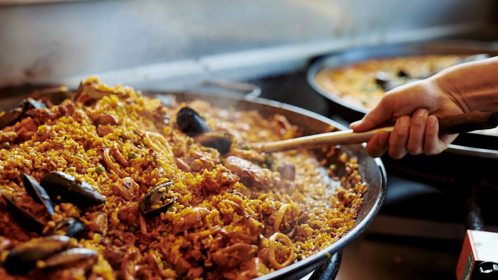 Seafood paella cooking in the pan at Black Drop, Black Rock