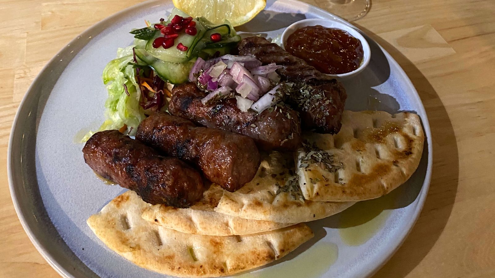 Cevapi with pita and red wine at Black Drop, Black Rock