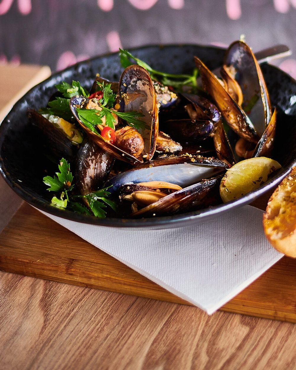 Bowl of mussels with grilled bread at Black Drop, Black Rock